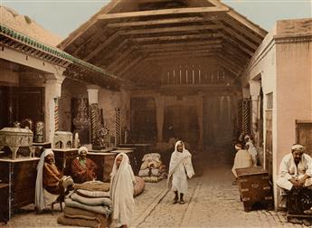 (TUNISIA & ALGERIA--AFRICA) An album with 25 pictures of busy bazaars, intimate portraits, and strikingly patterned interiors.